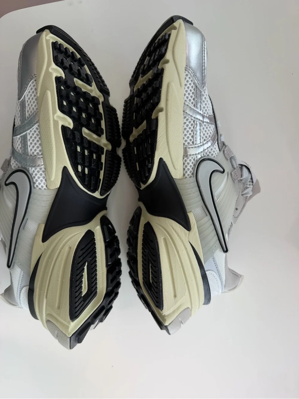 Women Nike V2K sneakers.